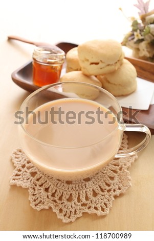 Milk tea with Scotland food scone for gourmet English breakfast image