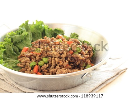 ethnic food, mince curry with green pea on pan