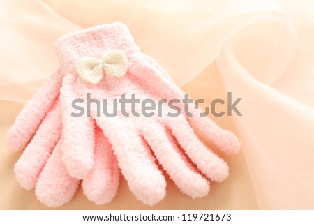 pink gloves with ribbon for winter warm fashion accessories image
