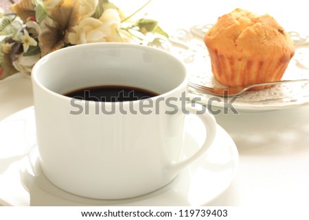 black coffee and home bakery muffin for western breakfast image
