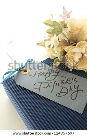 hand writing message card with bouquet and gift for Father\'s day image