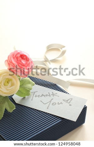 thank you card with blue gift box and flower bouquet