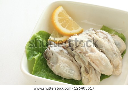freshness oyster from Japanese Hiroshima Prefecture, prepared with corn starch for cooking image