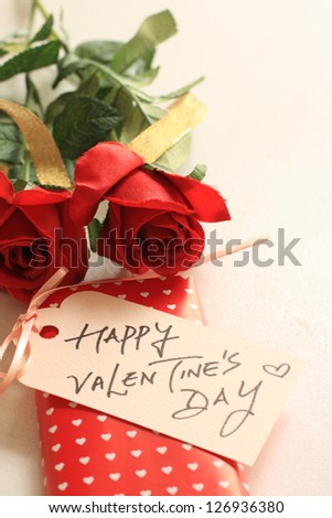 Valentine\'s day card and wrapped chocolate box
