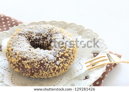 home bakery, sugar donut on white dish