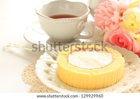 creamy roll cake and english tea for afternoon tea image
