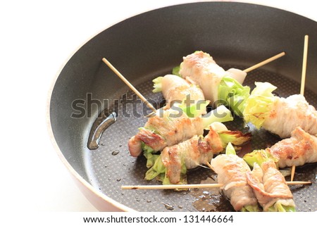japanese cuisine, cabbage in pork roll on pan for spring food image