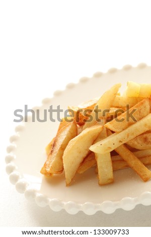 french fried on white dish with copy space for junk food image