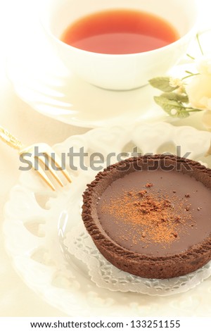 home bakery chocolate tart and black tea for afternoon tea image