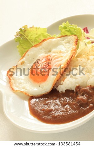 Japanese cuisine, sunny side up and curry rice for casual food image