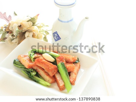  - stock-photo-thai-food-thot-man-pla-krai-and-green-leaf-vegetable-stir-fry-137890838