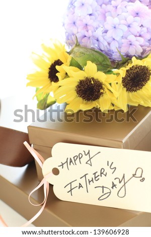 flower bouquet and gift box for father\'s day image