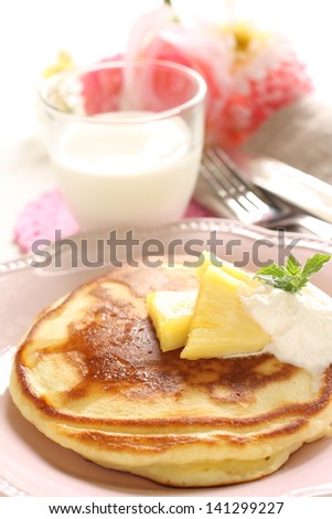 gourmet food, Pan cake and pineapple with milk on background,