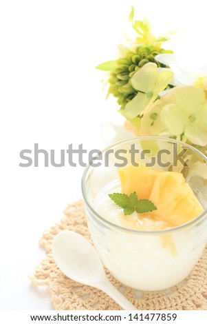 Healthy dessert, Pineapple and honey Yogurt in glass