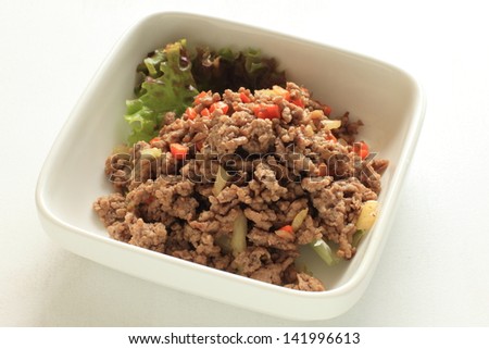 asian cuisine, mince meat and celery spicy stir fried