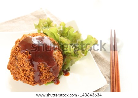 japanese food, mince beef croquette with brown sauce