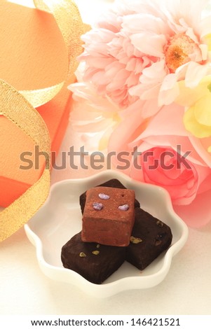 Gourmet dessert, homemade chocolate with flower for valentines day image