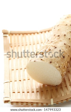 Japanese vegetable, nagaimo, Chinese yam, Korean yam on bamboo basket for healthy food image