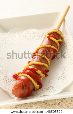 gourmet sausage on take out paper dish  for fast food image