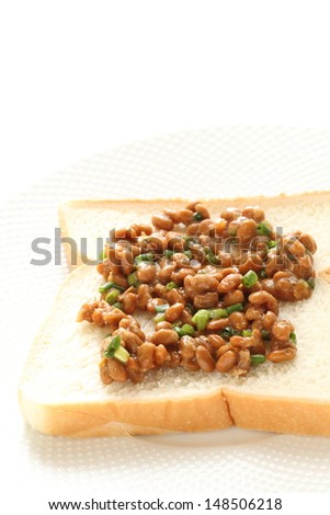 Japanese fusion food, Natto on bread for healthy food image