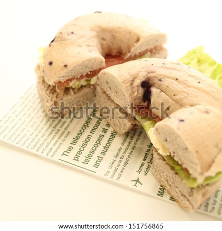 blue berry bagel with smoked salmon sandwich