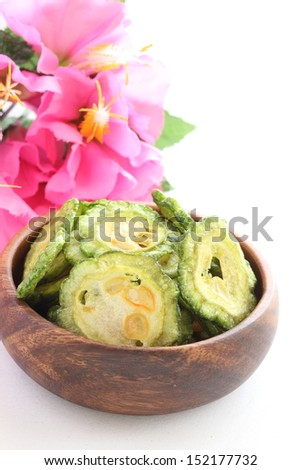 dried vegetable, sliced bitter melon on wooden bowl
