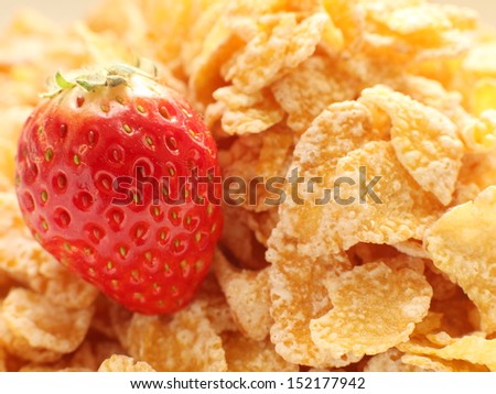 close up of corn flake and strawberry
