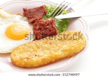 corn beef and sunny side up egg for western breakfast image