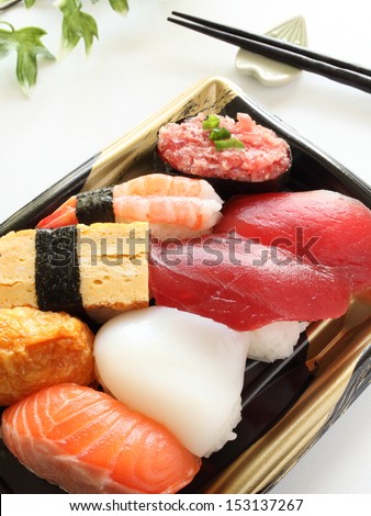 Japanese food, assorted sushi on plastic container for lunch pack image