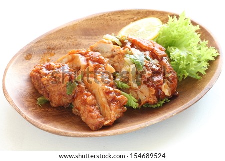 Chinese food, fried chicken with sour and sweet sauce