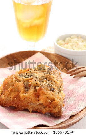 Gourmet food, fried chicken with iced drink and coleslaw salad