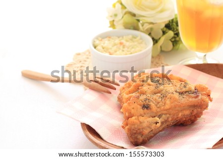 Gourmet food, fried chicken with iced drink and salad