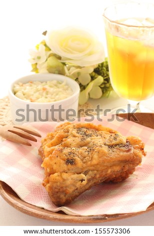Gourmet food, fried chicken with iced drink and salad
