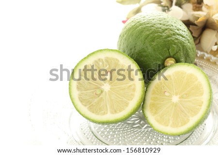 freshness green lemon cut in half on glass dish from Japan Ehime Prefecture for regional food image