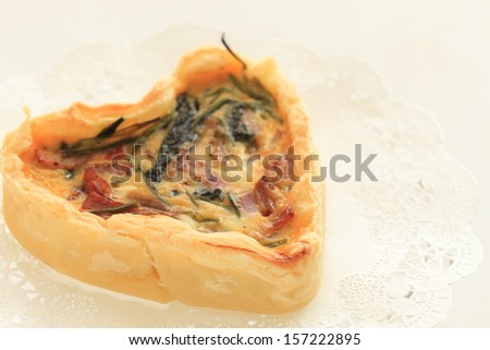 french food, Heart shaped Quiche on lace paper with copy space