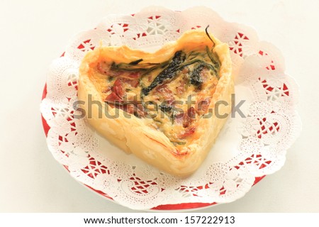 french food, Heart shaped Quiche on lace paper with copy space