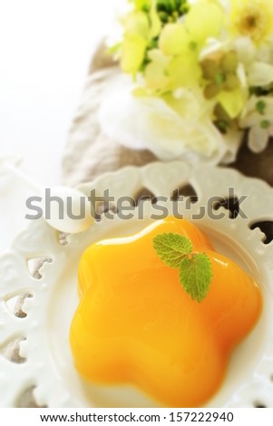 star shaped mango Jelly with mint for Kid menu in diorama style