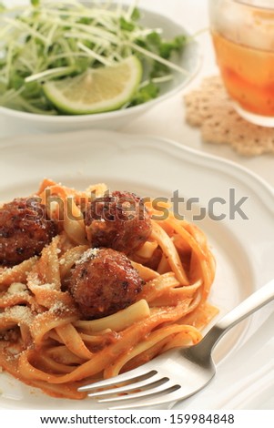 italian cuisine, close up of Bolognese sauce Meat ball and fettuccine Pasta