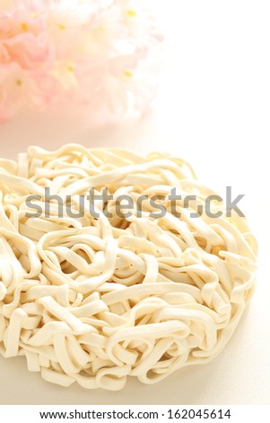 Japanese food, instant udon noodles on white background with copy sapce