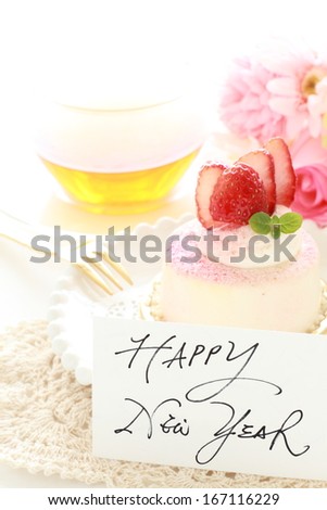Lovey strawberry mousse cake and tea with New year card for Cafe greeting background image