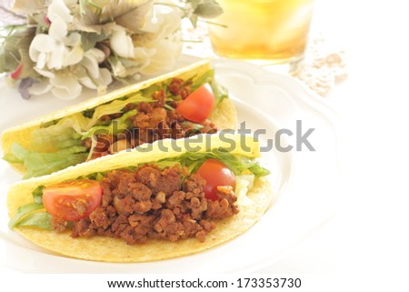 Mexican food, hard shell taco with mince beef and vegetable filling