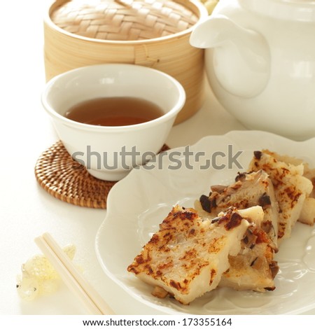 chinese new year food,  turnip cake and tea