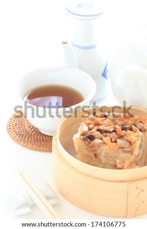 Chinese dim sum, steamed Turnip cake and tea