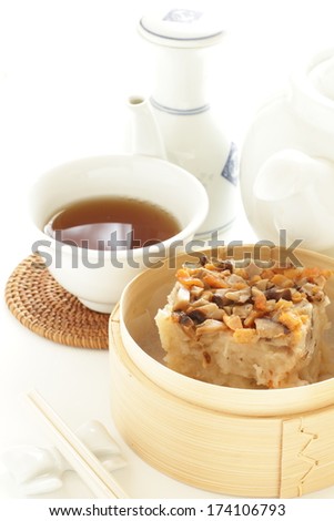 Chinese dim sum, steamed Turnip cake and tea