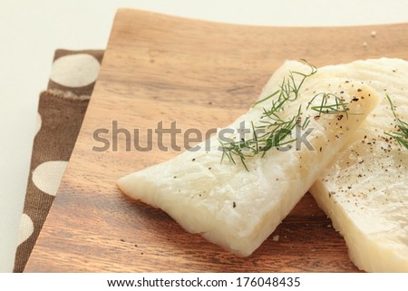 green herb Dill weed on Flat fish for prepared food image