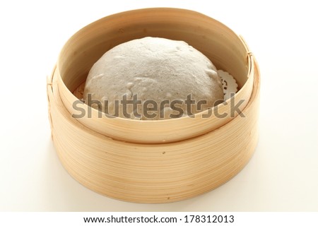 Chinese food, steamed Black sesame pasta bun in bamboo steamer