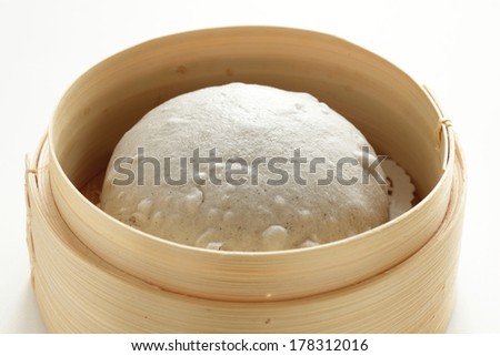 Chinese food, steamed Black sesame pasta bun in bamboo steamer