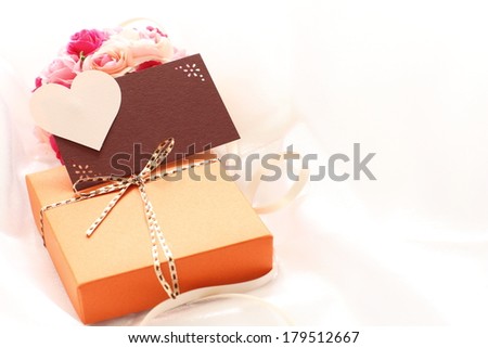 heart shaped greeting card with chocolate gift box for valentine\'s day and holiday image