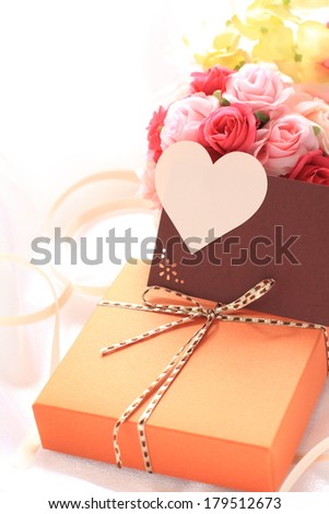 heart shaped greeting card with chocolate gift box for valentine\'s day and holiday image