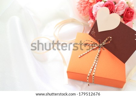 heart shaped greeting card with chocolate gift box for valentine's day and holiday image